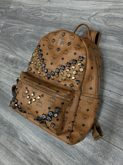 MCM Cognac Stark " M " Studded Backpack